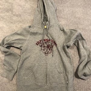 TNA zip up sweater